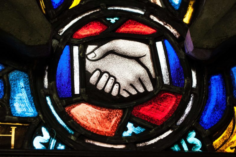 Stained Glass Shaking Hands