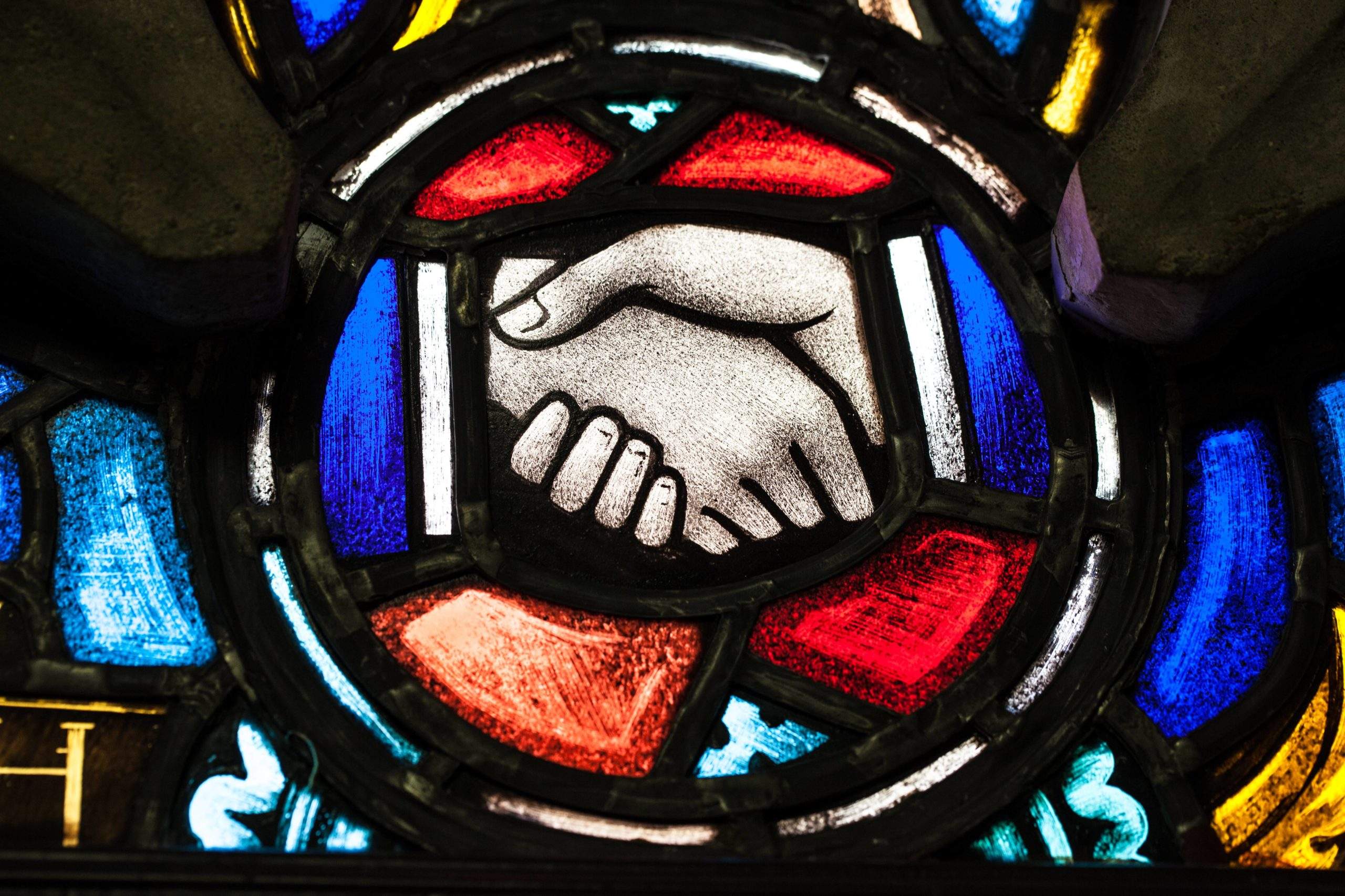 Stained Glass Shaking Hands